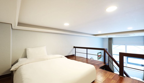 Habitación triple Deluxe (With Kitchen)