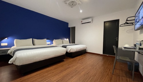 Habitación cuádruple Deluxe