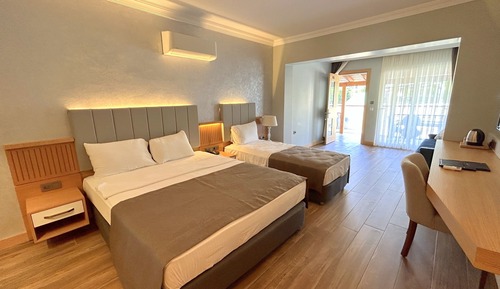 Habitación triple superior, varias camas
