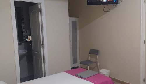 Habitación Familiar (4 camas individuales) Baño Privado