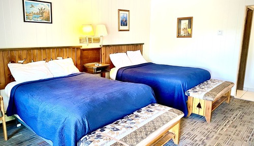 Habitación, varias camas