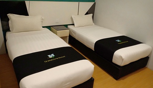 Habitación superior con 2 camas individuales