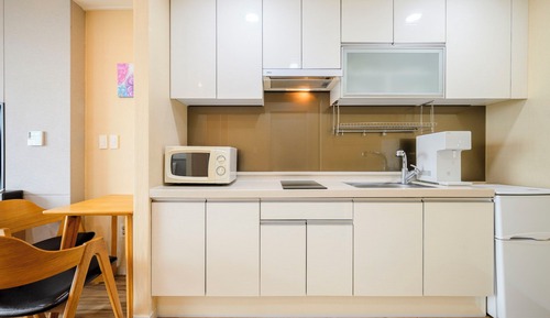 Habitación familiar, varias camas, no fumadores, vistas parciales al mar