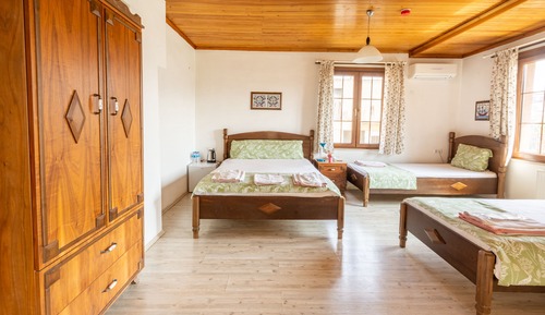 Habitación cuádruple familiar, vistas al jardín