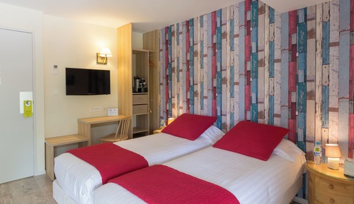 Habitación Confort con 1 cama doble o 2 individuales