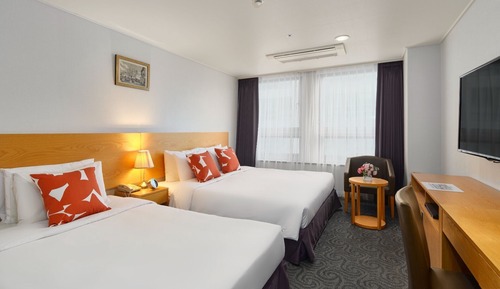 Habitación familiar con 2 camas individuales