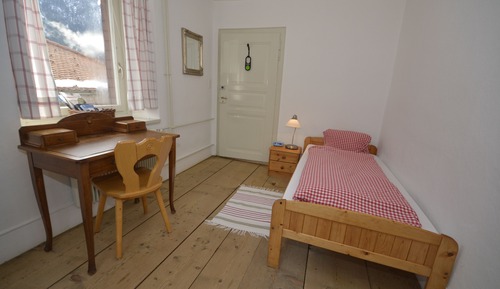 Habitación individual, baño compartido