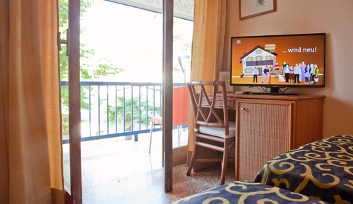 Habitación triple, balcón