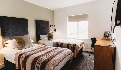 Habitación con 2 camas individuales