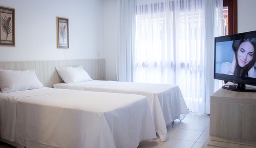 Habitación estándar con 1 cama doble o 2 individuales, vistas al jardín