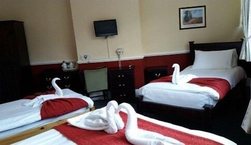 Suite superior, baño privado (DBL + 1SGL)