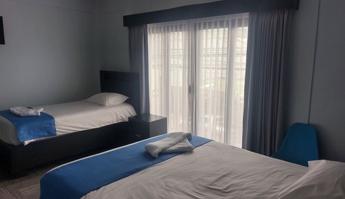 Habitación triple junior, varias camas