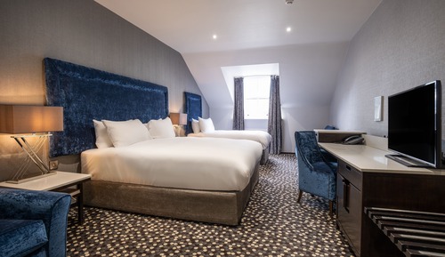 Habitación triple clásica, varias camas