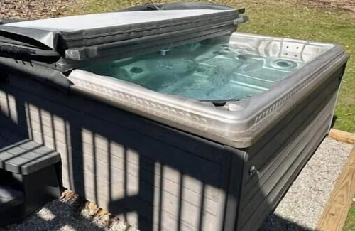 Gnaw Bone Casa | Peaceful home minutes from town. Hot tub, fire pit, game room. Dog friendly!