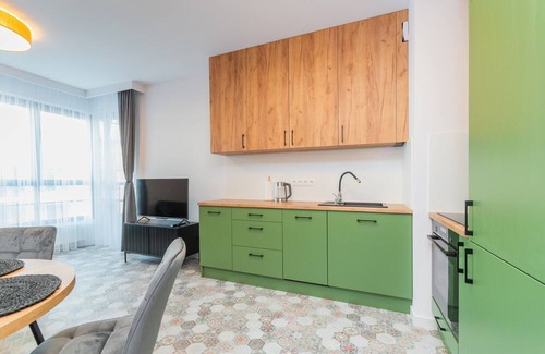 Mlyniska Apartamento | Doki- Pistacjowy by Grand Apartments