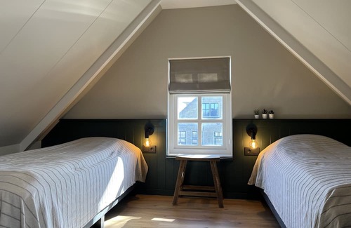 Kinnum Apartamento | Cozy apartment in the centrally located Baaiduinen