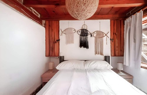 El Santuario Cabina | Hippie Ranch Cabaña en borde de lago