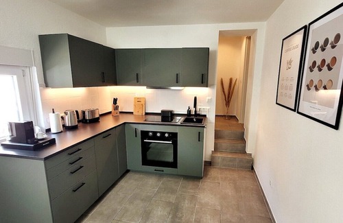 Siegburg Apartamento | Premium Suite: Workstation I Free Coffee I 65" 4K & Netflix