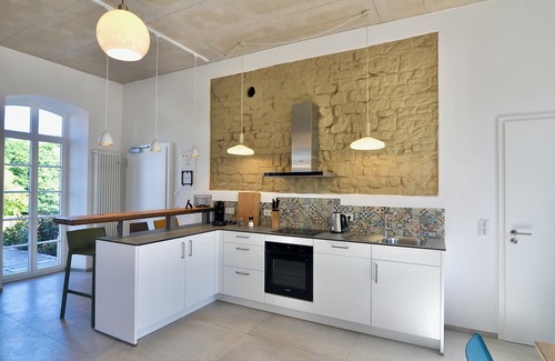 Baustert Apartamento | Modern living in the classroom of an old school