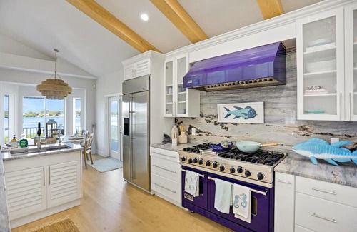 Palm Harbor Casa | Luxurious waterfront home w/pool, hot tub, game room, dock & water activities