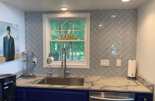 Lynn Center Casa | Best in QC! AweSpired Riverfront Retreat – Hot Tub, Fireplaces & Stunning Views!