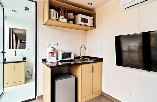 Taos Cabina | LUXX Space Cabin Tiny House with rooftop deck, private fenced patio.