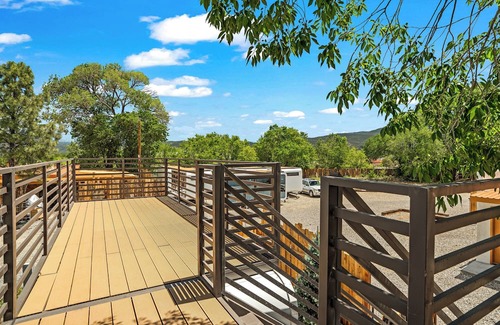 Taos Cabina | LUXX Space Cabin Tiny House with rooftop deck, private fenced patio.