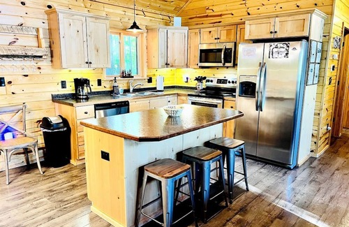 Stone Lake Cabina | Cozy Lakefront Retreat with Game Room, Outdoor Living and Dock in Wisconsin