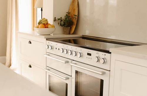 Acrefair Casa | A luxurious riverside cottage with stunning views, a hot tub, and fishing access.