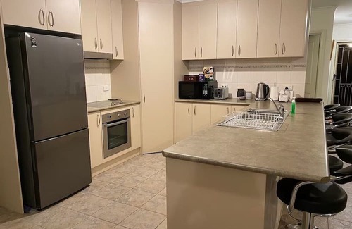 Kirwans Bridge Casa | Waterfront 4 Bedroom Home with Rumpus Room