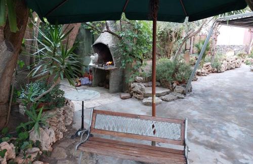 Torre del Pozzo Apartamento | Relax in giardino