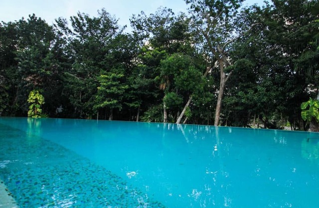 Cheerful 2BR Home in Jungle Oasis w/Pool + Beach