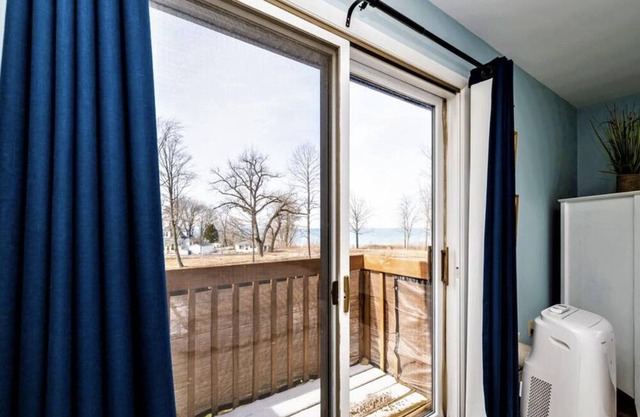 Condo on Lake Michigan with a pool and a private beach! Bring your Family