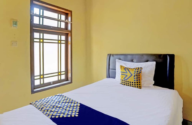 SPOT ON 92480 Iwn Homestay Syariah