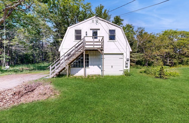 Inviting Apartment with Family-Friendly Comforts and Serene Outdoor Spaces