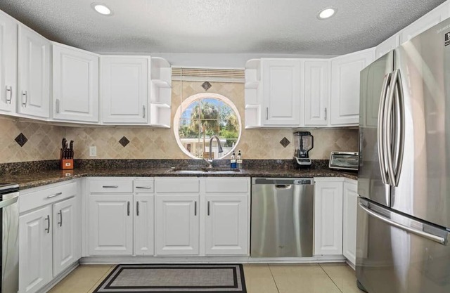 Canal View with Pool, Game Room, Dock & More!