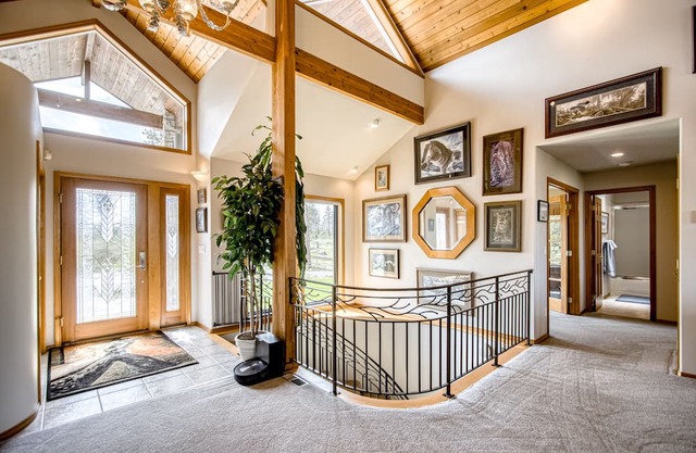 Vast countryside house with wide-ranging views, double deck, bar, & fireplaces