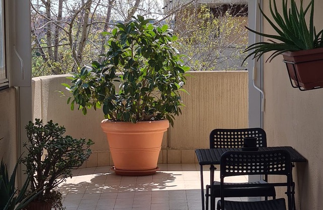 Holiday Home 'Rooms and Comfort Apartment' with Shared Garden, Wi-Fi and Air Conditioning