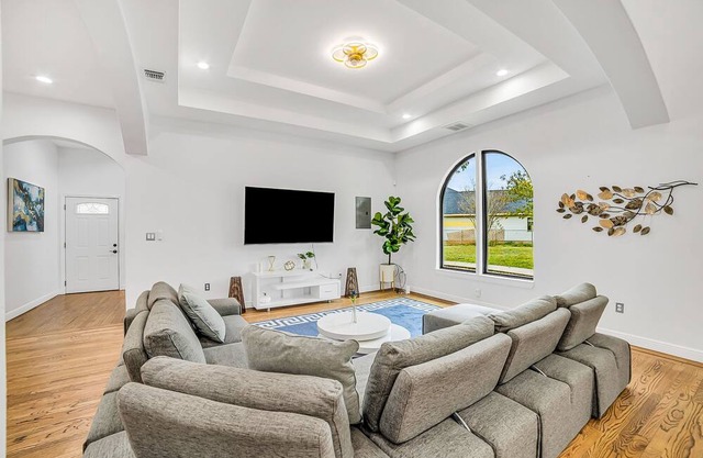 Stunning and luxe ranch-style home with large patio, grill, air hockey, firepit