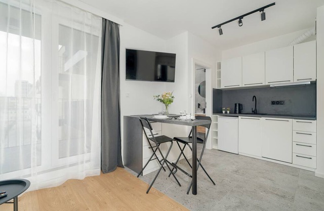 Dark Grey Apartment in Poznan by Renters