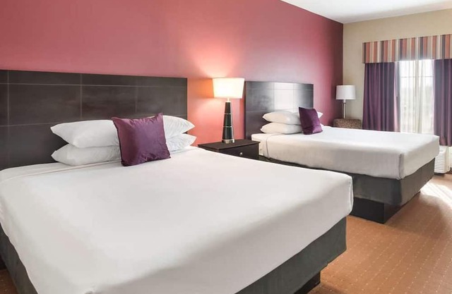 3 Budget-Friendly Accommodations in Knights Inn Bunkie! Pool, Free Breakfast!