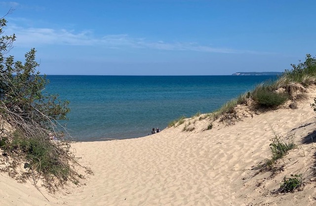 Cozy 3-bedroom cottage, large yard, minutes from Lake Michigan. Pet friendly.