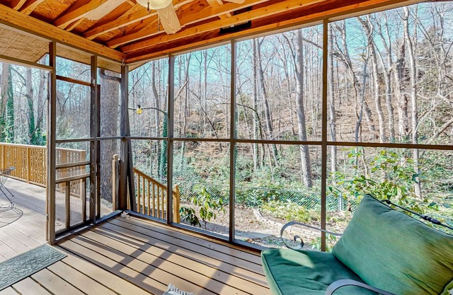 Dog-friendly home near Clemson with tree-lined yard, patio & deck