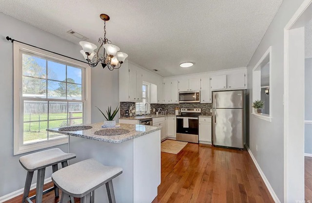 Charming private 3 bedroom home - fenced in yard