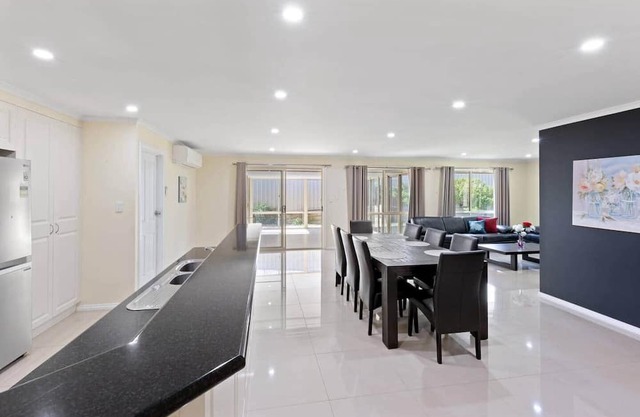 Comfortable 4-Bedroom Home with Backyard Escape