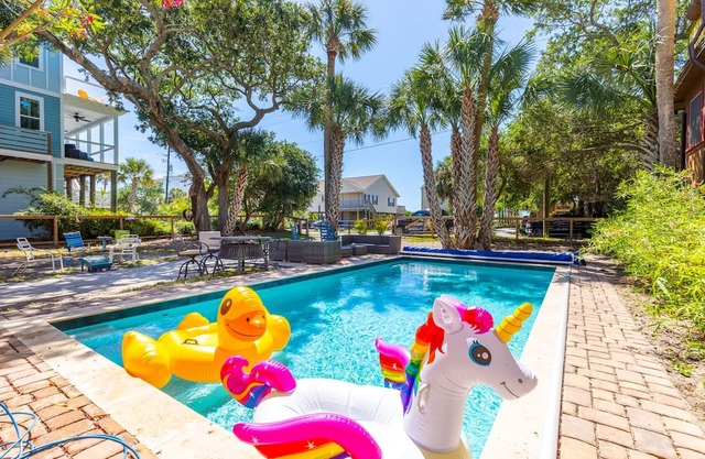 Coastal dog-friendly home with pool, ocean views & fenced yard