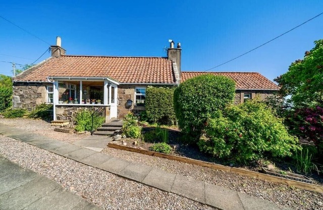 Spacious family-friendly cottage within hillside village