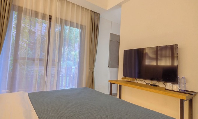 Emeishan Casa | Room-heinemann Hotel Courtyard or Terrac