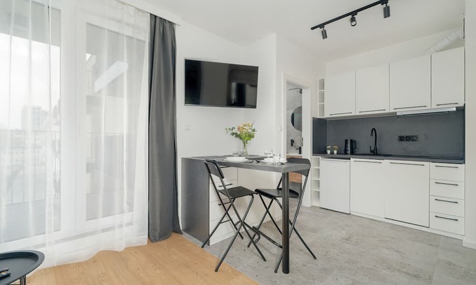 Jezyce Apartamento | Dark Grey Apartment in Poznan by Renters