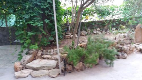 Torre del Pozzo Apartamento | Relax in giardino